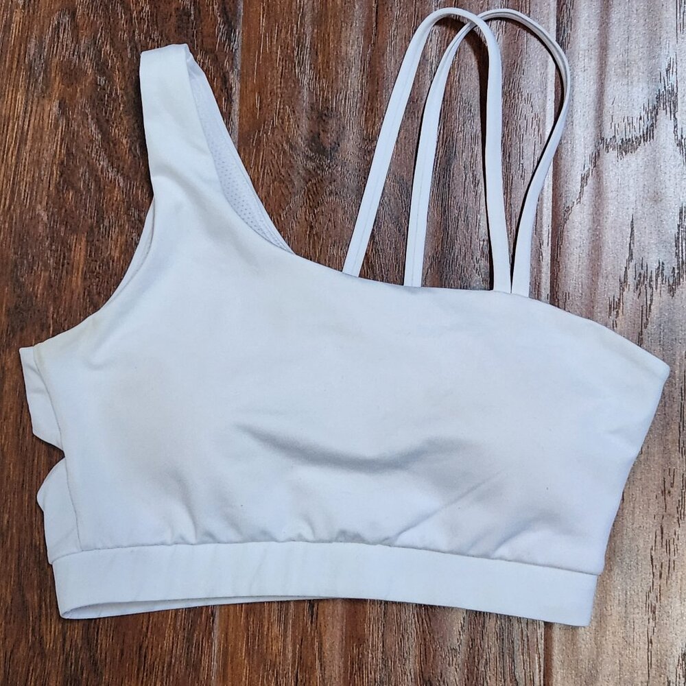 White asymmetrical workout padded bra